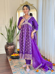 Charming purple embroidered kurta suit with matching dupatta and pants