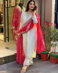 Stylish white kurta and pants with detailed pink dupatta design