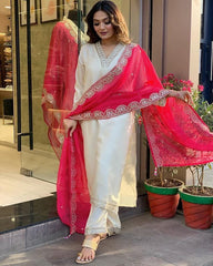 Stylish white kurta and pants with detailed pink dupatta design