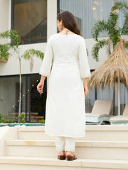 Traditional festive kurta ensemble featuring embroidery and matching dupatta