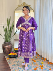 Charming purple embroidered kurta suit with matching dupatta and pants