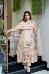 Graceful embroidered ethnic wear in soft pastel with sheer dupatta