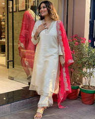 Stylish white kurta and pants with detailed pink dupatta design