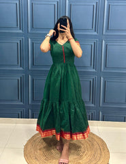 Vibrant Green Tiered Dress with Traditional Border