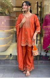 Rust Orange Embroidered Three-Piece Suit with Dupatta & Potli Bag