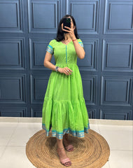 Vibrant Green Tiered Dress with Traditional Border