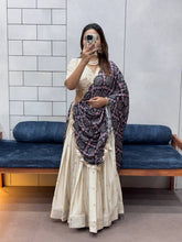 Festive ready in a silk lehenga and printed dupatta