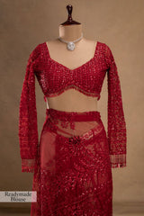 Heavy Red Sequined Net Saree.