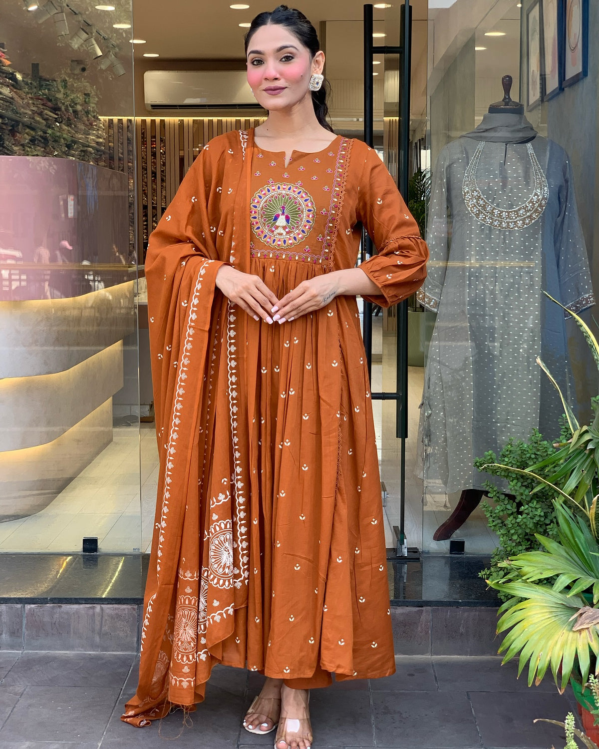 Traditional embroidered Anarkali set with dupatta and stylish design