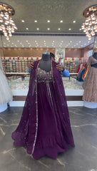 Regal Gown with Silver Embellishment and Cape Sleeves