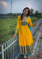Festive Yellow Anarkali Suit with Blue Zari Border