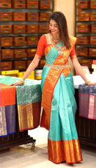 Stunning Aqua Blue and Coral Orange Silk Blend Kanjivaram Style Saree